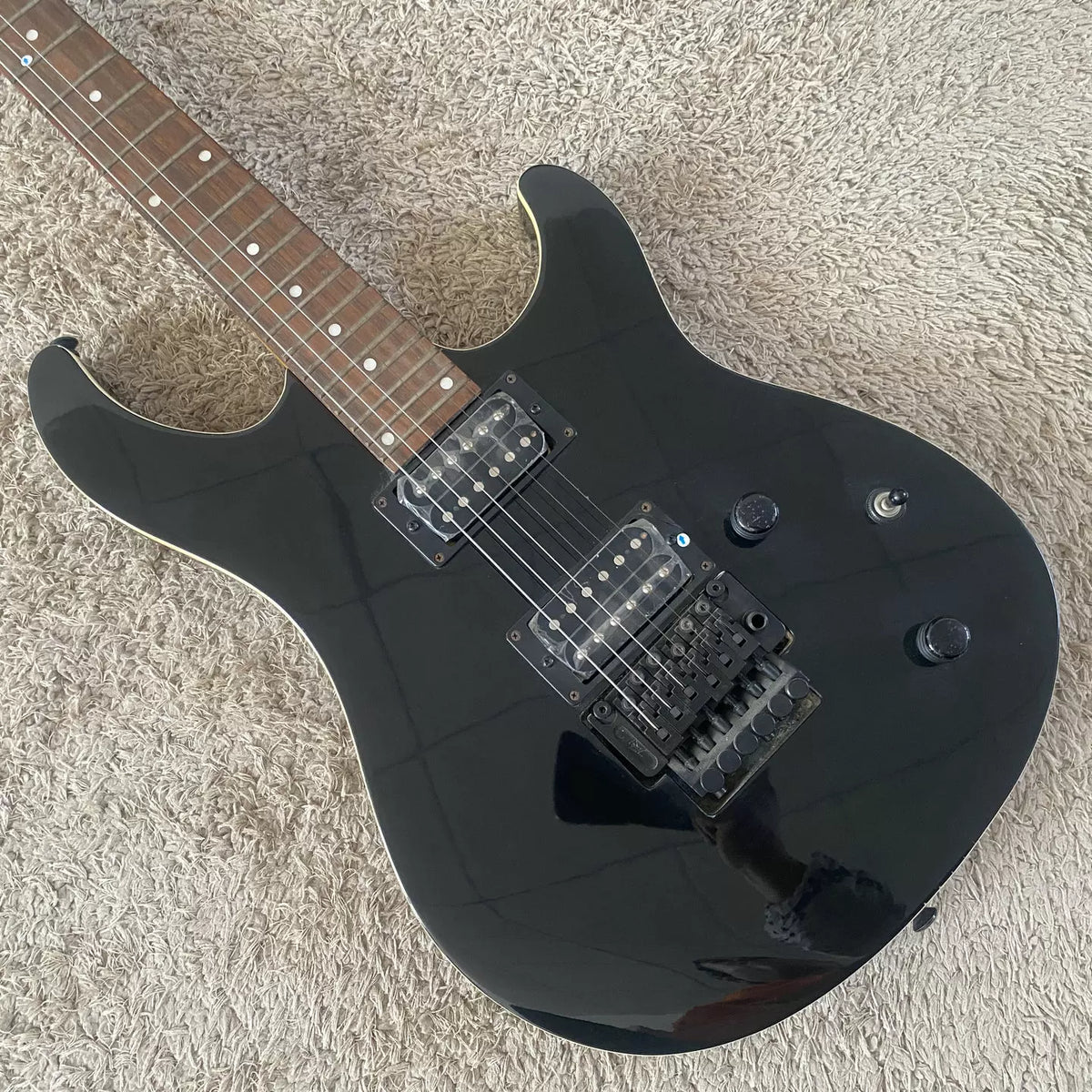 Budweiser Payvey rebranded large double-tremolo electric guitar, black, dual pickups, 24-fret, minor stock defects.