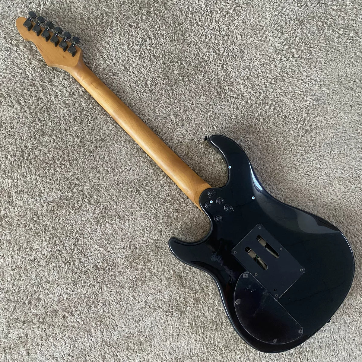 Budweiser Payvey rebranded large double-tremolo electric guitar, black, dual pickups, 24-fret, minor stock defects.