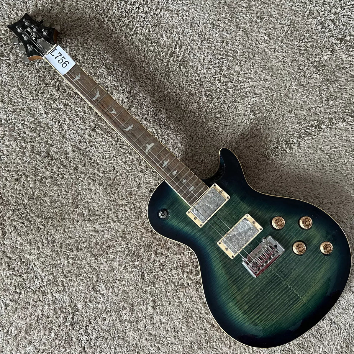 Mclonence electric guitar, maple tiger stripe, small double-tremolo, Wilkinson pickups (in stock).