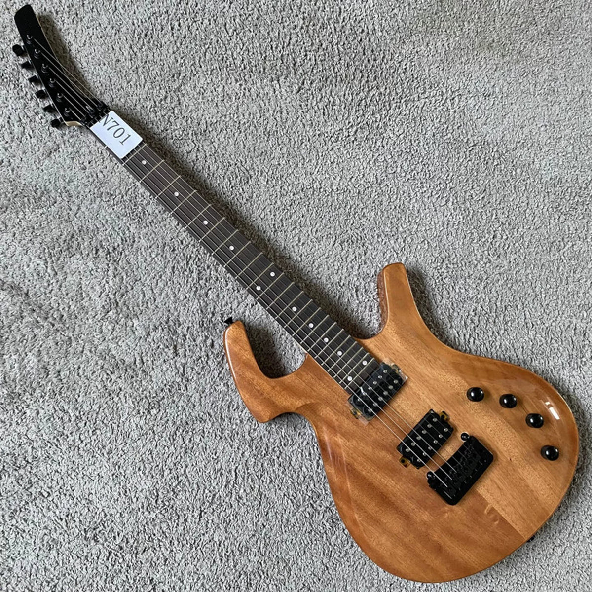 Solid mahogany body, 24 frets, rosewood double-tremolo electric guitar, Parker style, brand-name, with polished label, for export.