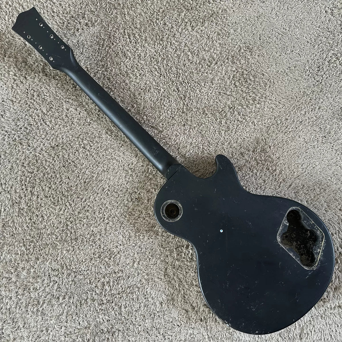 Harley Benton LP electric guitar, unfinished, no accessories, left-hand/reverse-hand DIY, black with minor flaws.