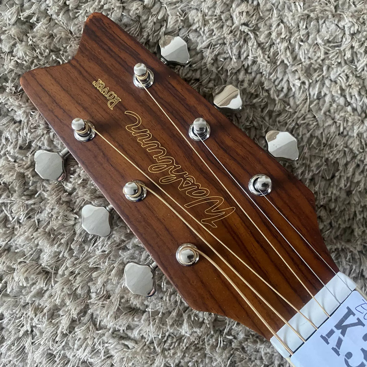 Washburn RO10 Warrior 34-inch acoustic guitar with solid top, travel style, comes with bag, original wood, minor flaws.
