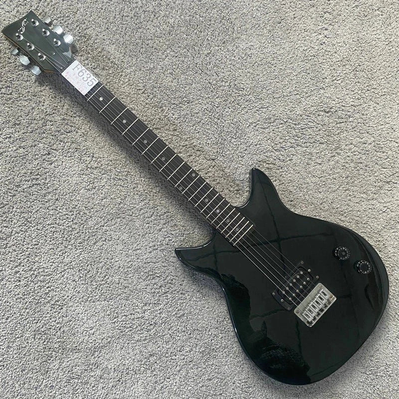 First Act Electric Guitar in Black, Maple Neck, Rosewood Fingerboard