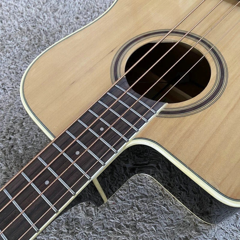 Left Handed Eko 4 String Acoustic Bass, Spruce Top Body, Mahogany Neck